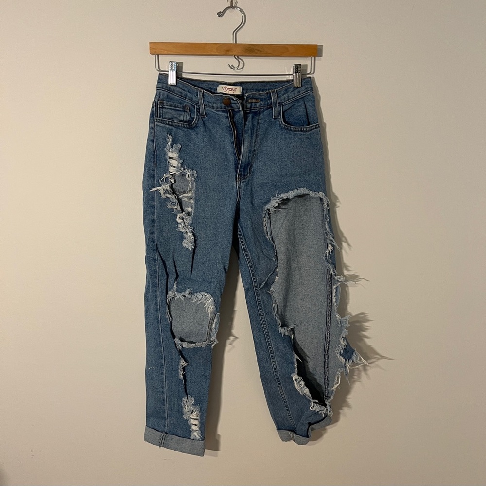 VERY distressed vibrant jeans